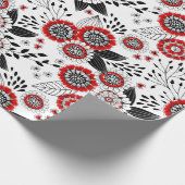 Doodle bloemen en bladeren in rood en zwart cadeaupapier (Hoek)