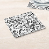 Doodle-bugs in donkerblauw kartonnen onderzetters (Schuin)