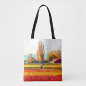 Door gouden en rode Tulpvelden rollen Tote Bag (Voorkant)