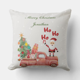 Douane Ho Ho Santa op een rode vrachtwagen in de s Kussen