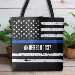 Douane Politieagent Dunne Blauwe Lijn Gepersonalis Tote Bag<br><div class="desc">Introductie van onze nieuwe Thin Blue Line Flag Canvas tas, ideaal voor politieagenten, politie moeders, politie vrouwen, politie vrouwen, en iedereen die wil show op hun steun voor de wetshandhaving. Ontworpen in een benauwde stijl, deze canvas tas heeft de Amerikaanse vlag met een opvallende dunne blauwe lijn die staat voor...</div>