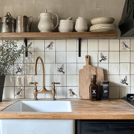 Downy Woodpecker op de vlucht Tegeltje