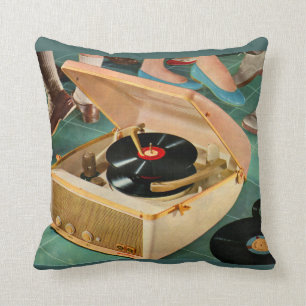 Draagbare 1950-recordspeler met records kussen
