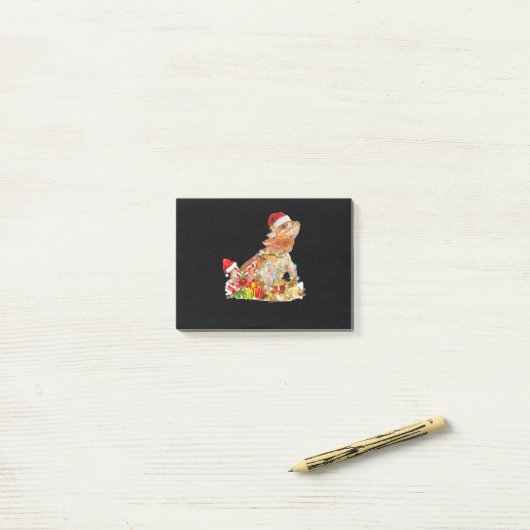 Draagbare kerstdagen met kerstlampjes post-it® notes (Op bureau)