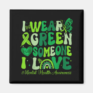Draagt groene shirt voor de maand van de mentale g magneet