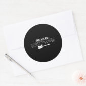 Draagt op de bassafrolgitaar ronde sticker (Envelop)