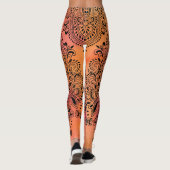 Draai zwart Ornament op roze & gele achtergrond Leggings (Achterkant)