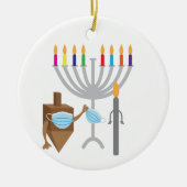 Draaiende bovenkant en kaars met gezichtsmasker keramisch ornament (Voorkant)