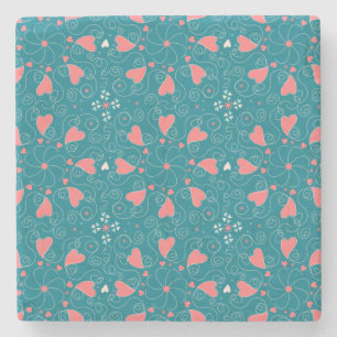 Draaiende roze harten op blauwgroen. met de hand g stenen onderzetter