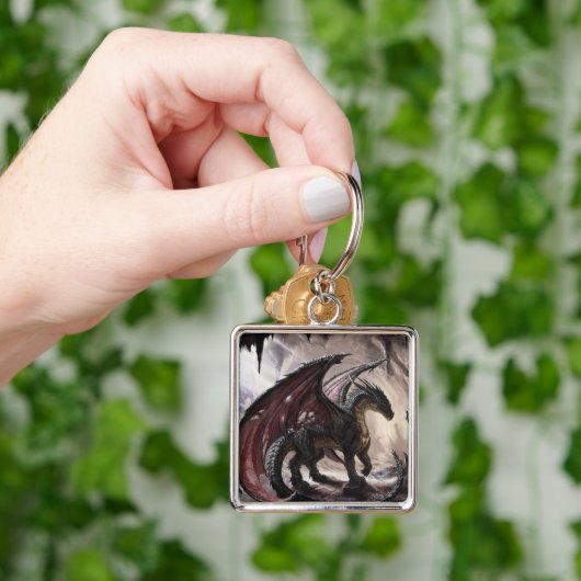 Draak in grot sleutelhanger (Hand)