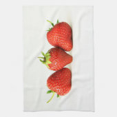 Drie aardbeien op witte kitcna theedoek (Verticaal)
