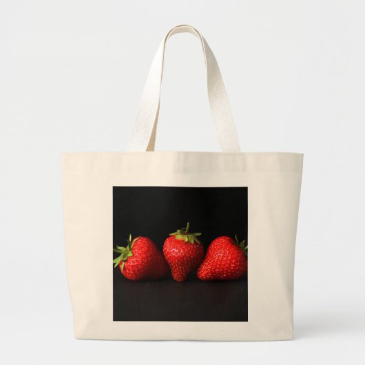 Drie aardbeien op zwart jtcnm grote tote bag (Voorkant)