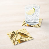 Drie binnenlandse vogels op een filiaal kartonnen onderzetters (Insitu)