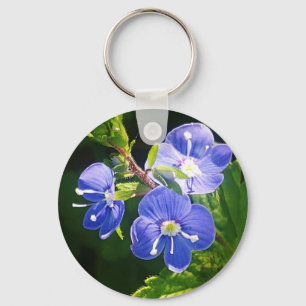 Drie blauwe bloemen sleutelhanger
