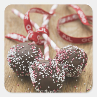 Drie chocoladelollipops vierkante sticker
