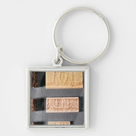 Drie cilinderzegels met indrukking sleutelhanger (Voorkant)