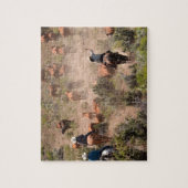 Drie cowboys die runderen besturen legpuzzel (Verticaal)