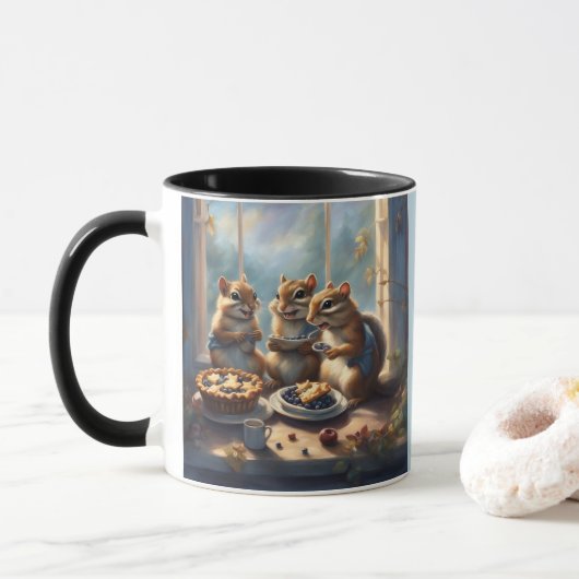 Drie eekhoorns eten bosbessentaarten op het aanrec mok (Met donut)