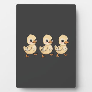 Drie eendjes lopen achter elkaar – Schattig Fotoplaat