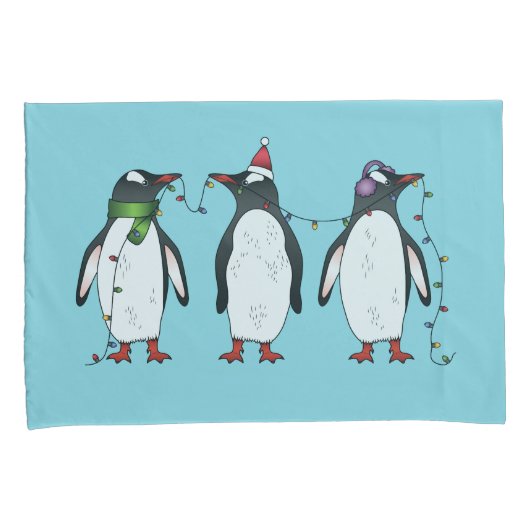 Drie feestelijke kerstpinguïns op lichtblauw kussensloop (Voorkant-Rechts)