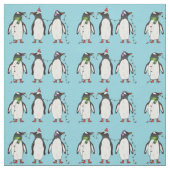 Drie feestelijke kerstpinguïns op lichtblauw stof (Swatch)