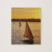 Drie feodka's met bliksem op de Nijlrivier Legpuzzel (Verticaal)