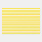 Drie gele stripes met schaduwen die papierbladen v inpakpapier vel (Voorkant 2)