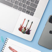 Drie gitaren sticker (Laptop met iPhone)