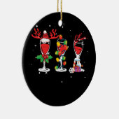 Drie glazen kerstkerstman met rode wijn keramisch ornament (Rechts)