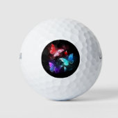 Drie gloeiende vlinders op een nachtachtergrond golfballen (Voorkant)
