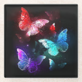 Drie gloeiende vlinders op nachtrust achtergrond glazen onderzetter (Voorkant)
