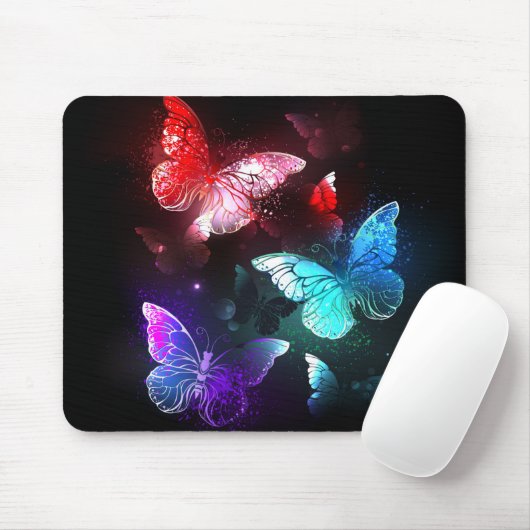 Drie gloeiende vlinders op nachtrust muismat (Met muis)