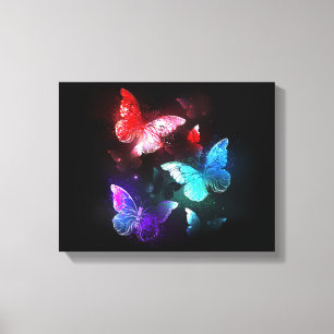 Drie gloeiende vlinders op nachtrustachtergrond canvas afdruk