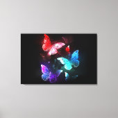Drie gloeiende vlinders op nachtrustachtergrond canvas afdruk (Voorkant)
