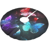 Drie gloeiende vlinders op nachtrustrondergrond kerstboom rok (Gekanteld)