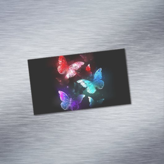 Drie gloeiende vlinders op nachtrustrondergrond magnetisch visitekaartje (Voorbeeld)