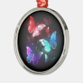 Drie gloeiende vlinders op nachtrustrondergrond metalen ornament (Links)