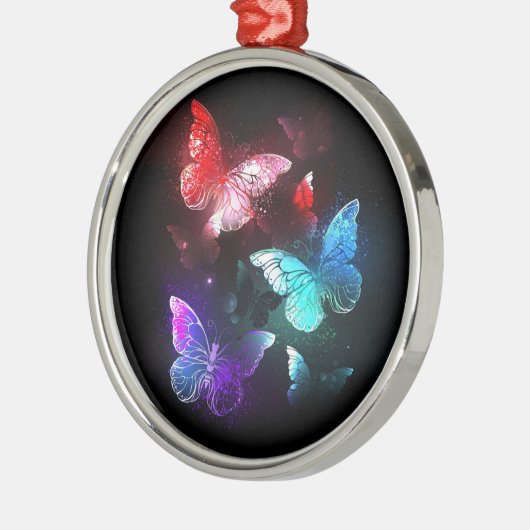 Drie gloeiende vlinders op nachtrustrondergrond metalen ornament (Links)
