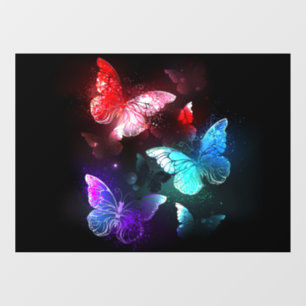 Drie gloeiende vlinders op nachtrustrondergrond raamsticker