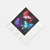 Drie gloeiende vlinders op nachtrustrondergrond servet (Hoek)