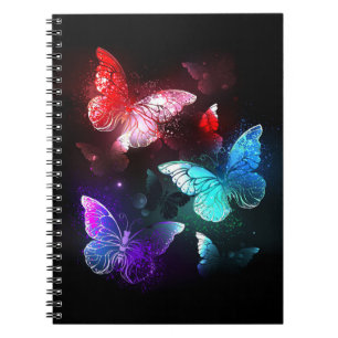 Drie golvende Butterflies op nachtachtergrond Notitieboek