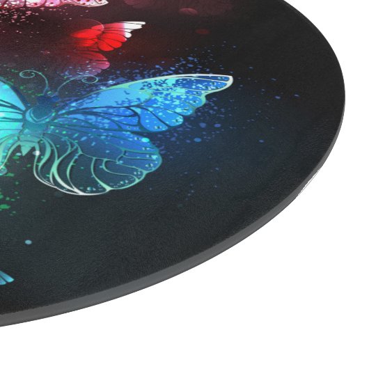 Drie golvende Butterflies op nachtachtergrond Snijplank (Hoek)