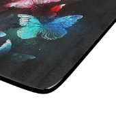 Drie golvende Butterflies op nachtachtergrond Snijplank (Hoek)