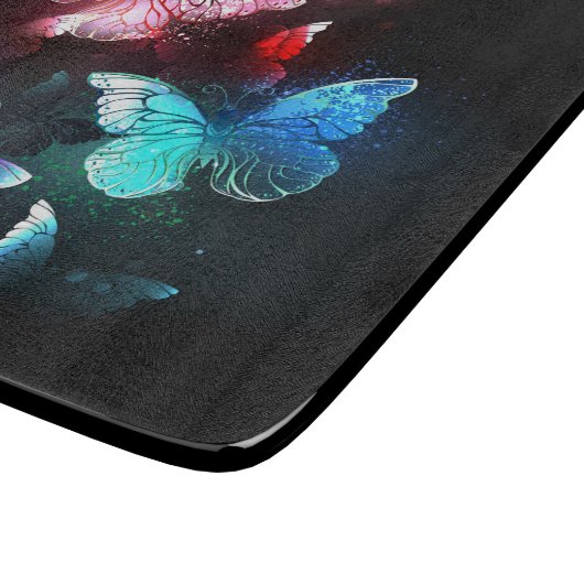 Drie golvende Butterflies op nachtachtergrond Snijplank (Hoek)