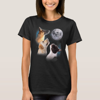 Drie grappige honden die naar de eigenaar van het  t-shirt