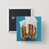 Drie hotdogs in bundels vierkante button 5,1 cm (Voorkant /achterkant)