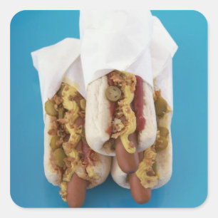 Drie hotdogs in bundels vierkante sticker