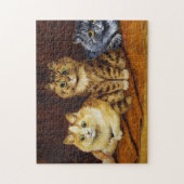 Drie Katten op een Perzisch Rug van Louis Wain Legpuzzel (Verticaal)