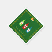 Drie kerstgnomen op groen servet (Hoek)