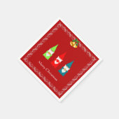 Drie kerstgnomen op rood servet (Hoek)